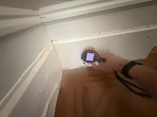Moisture meter reading 597 REL in the reception room