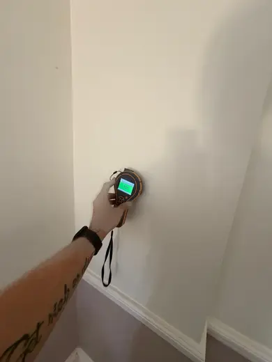 Moisture meter reading 165 REL in the reception room