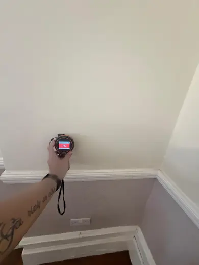 Moisture meter reading 792 REL in the reception room