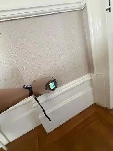 Moisture meter reading 180 REL in the reception room