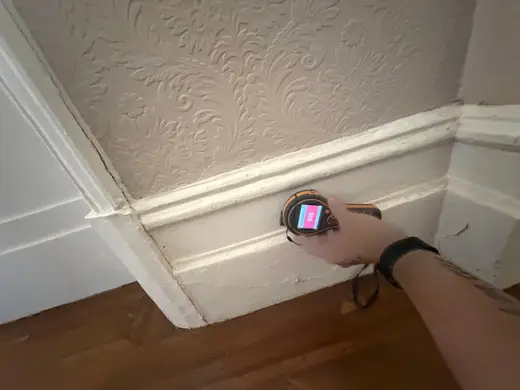 Moisture meter reading 638 REL in the reception room