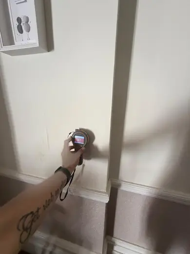 Moisture meter reading 877 REL in the reception room
