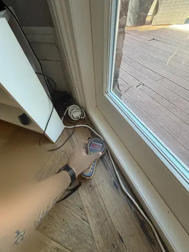 Moisture meter reading 746 REL in the reception room
