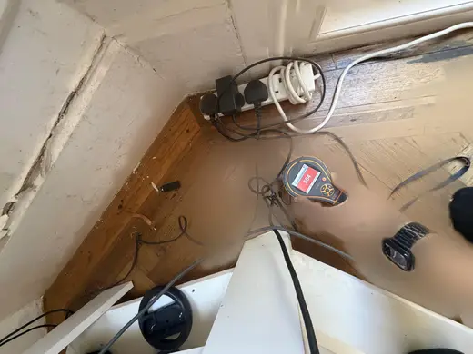 Moisture meter reading 584 REL in the reception room
