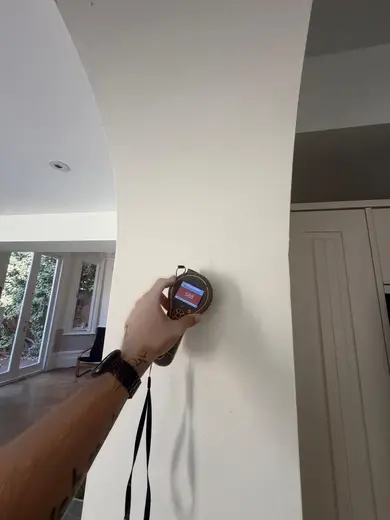 Moisture meter reading 588 REL in the kitchen