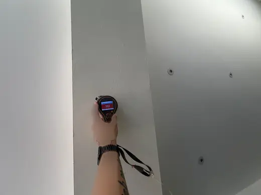 Moisture meter reading 333 REL in the kitchen
