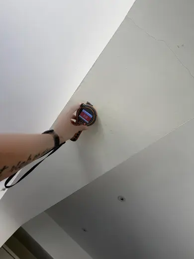 Moisture meter reading 232 REL in the kitchen