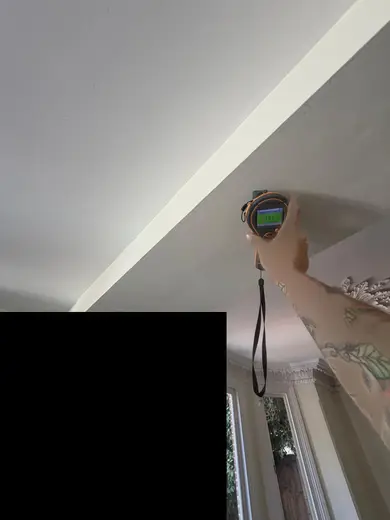 Moisture meter reading 161 REL in the kitchen