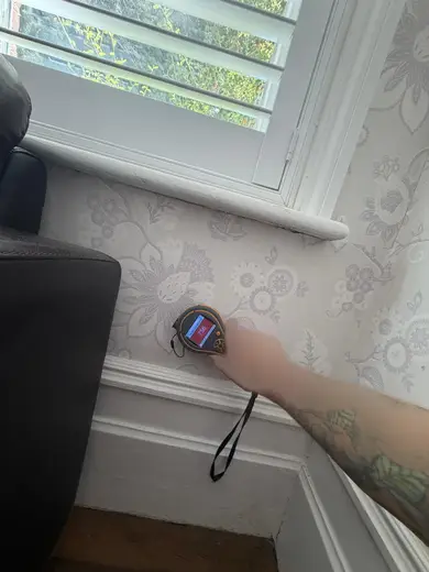 Moisture meter reading 756 REL in the front living room