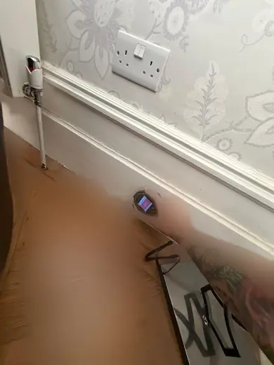 Moisture meter reading 827 REL in the front living room