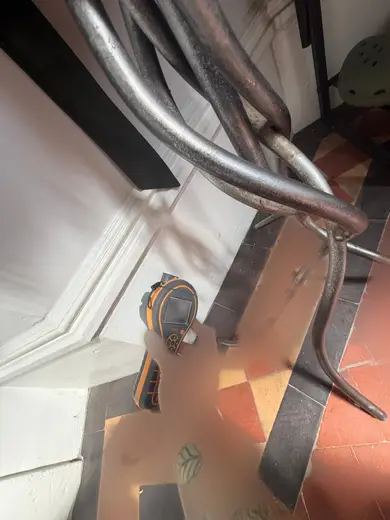 Photograph from entrance hallway taken during the damp survey