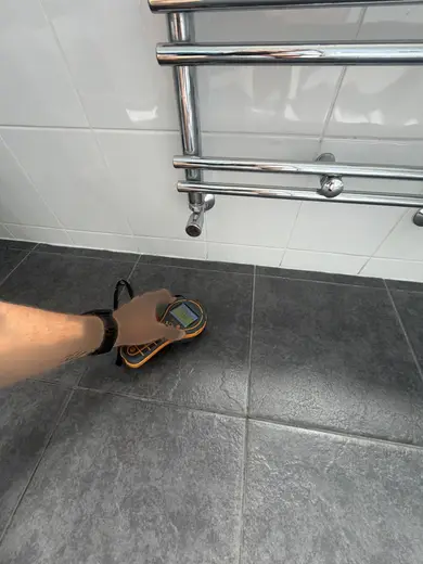 Moisture meter reading 188 REL in the 1st floor bathroom