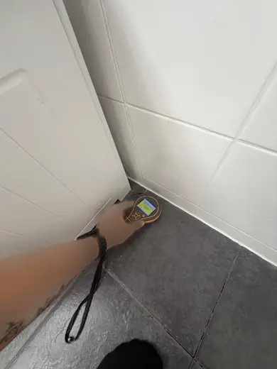 Moisture meter reading 185 REL in the 1st floor bathroom