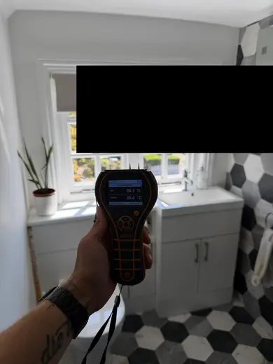 Moisture meter reading 55.1% RH in the 2nd floor bathroom