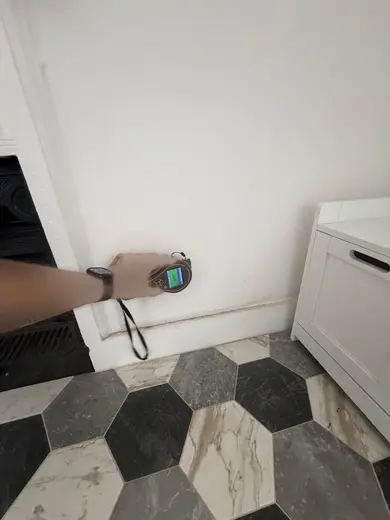 Moisture meter reading 144 REL in the 2nd floor bathroom