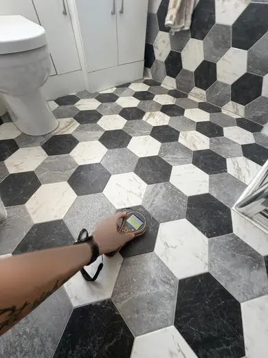 Moisture meter reading 171 REL in the 2nd floor bathroom