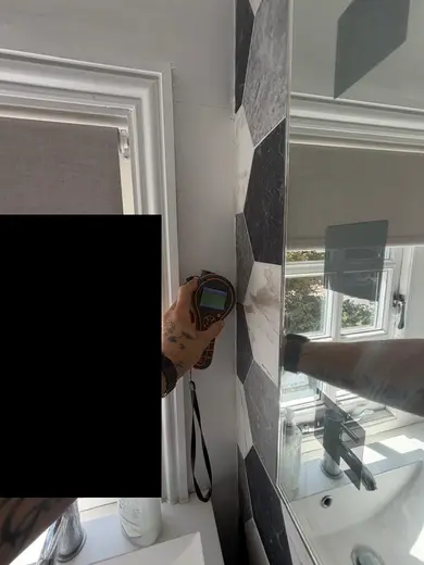 Moisture meter reading 137 REL in the 2nd floor bathroom