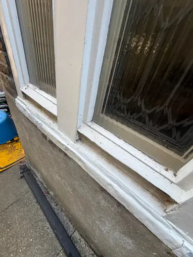 Photograph from exterior taken during the damp survey