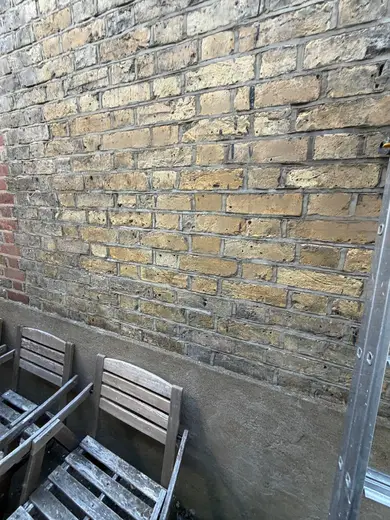 Photograph from exterior taken during the damp survey