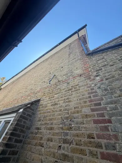 Photograph from exterior taken during the damp survey
