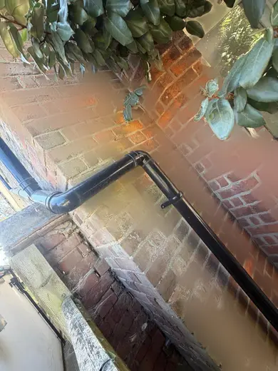 Photograph from exterior taken during the damp survey